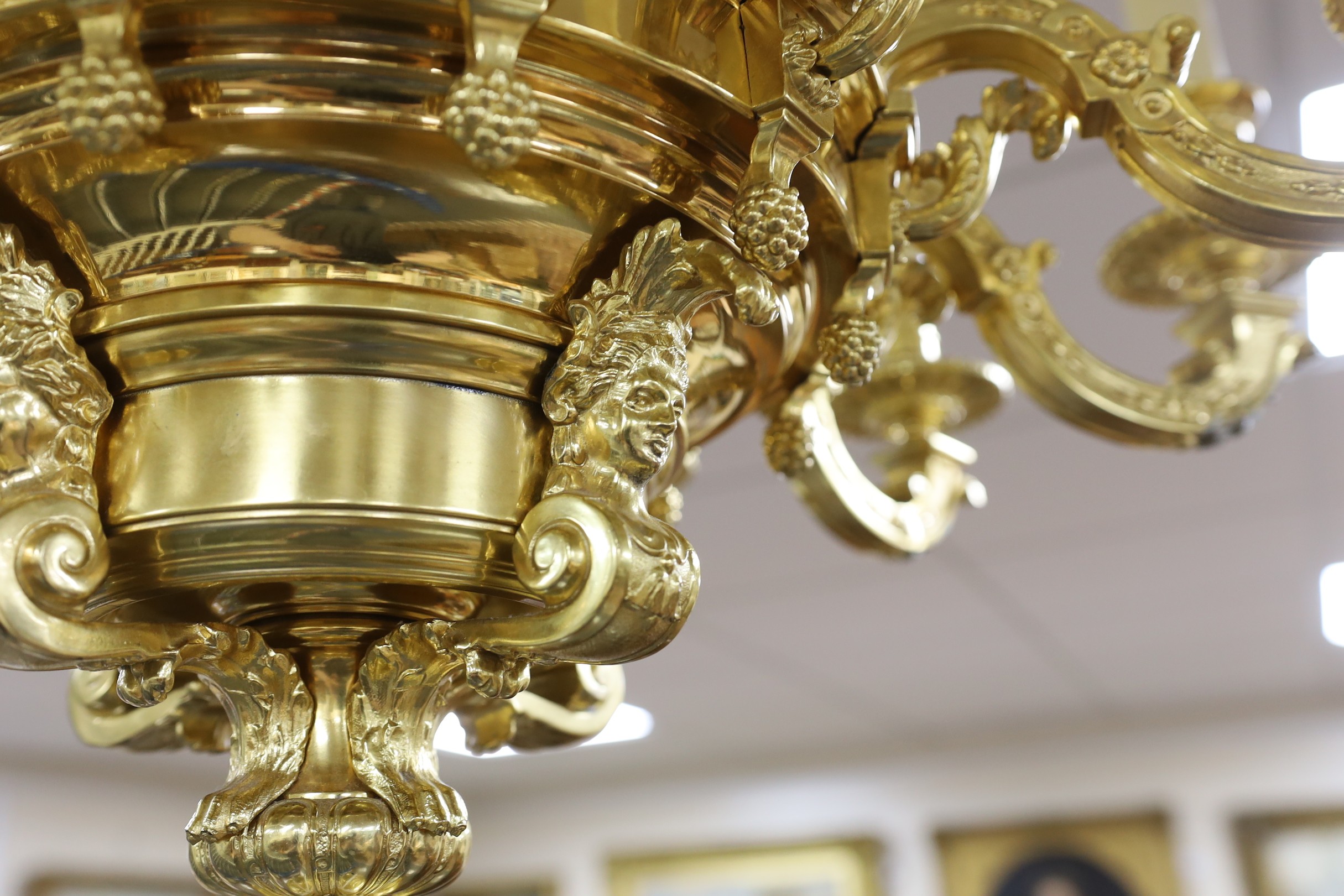 A 20th century brass and ormolu chandelier, after a design by Daniel Marot